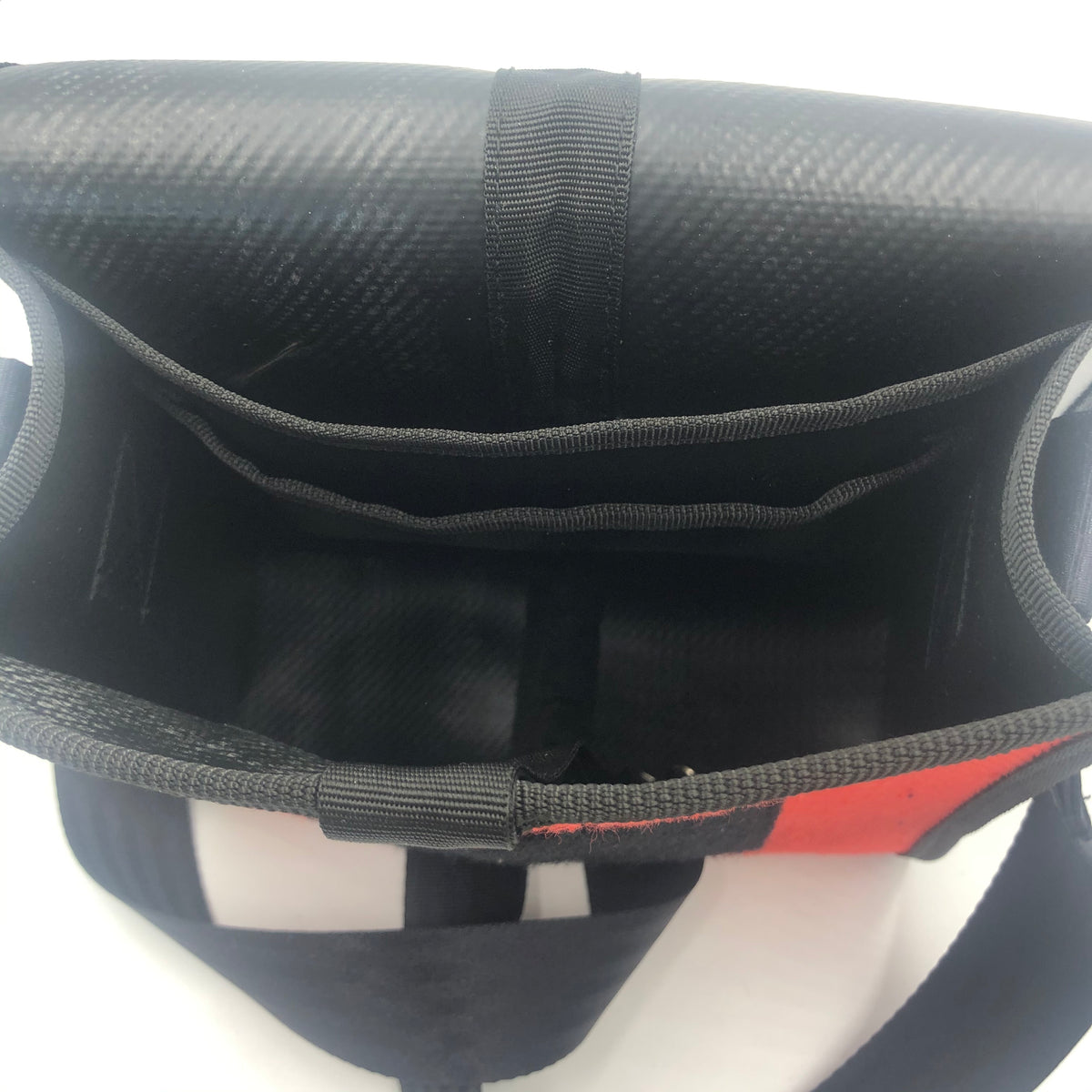 Messenger bag made from recycled fire hose